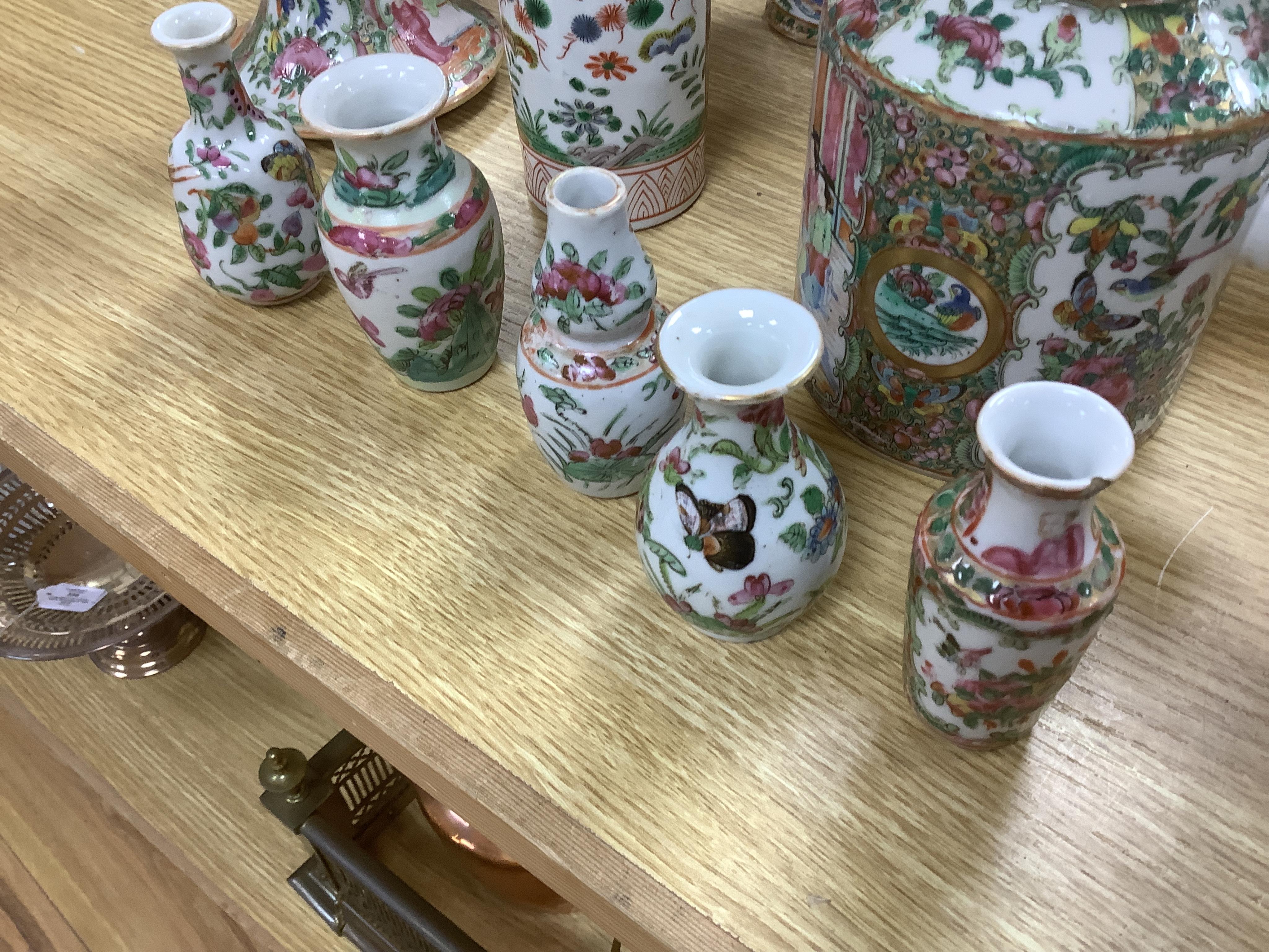 A group of 19th century and later Chinese famille rose porcelain vases and teapots, tallest 39cm high. Condition - poor